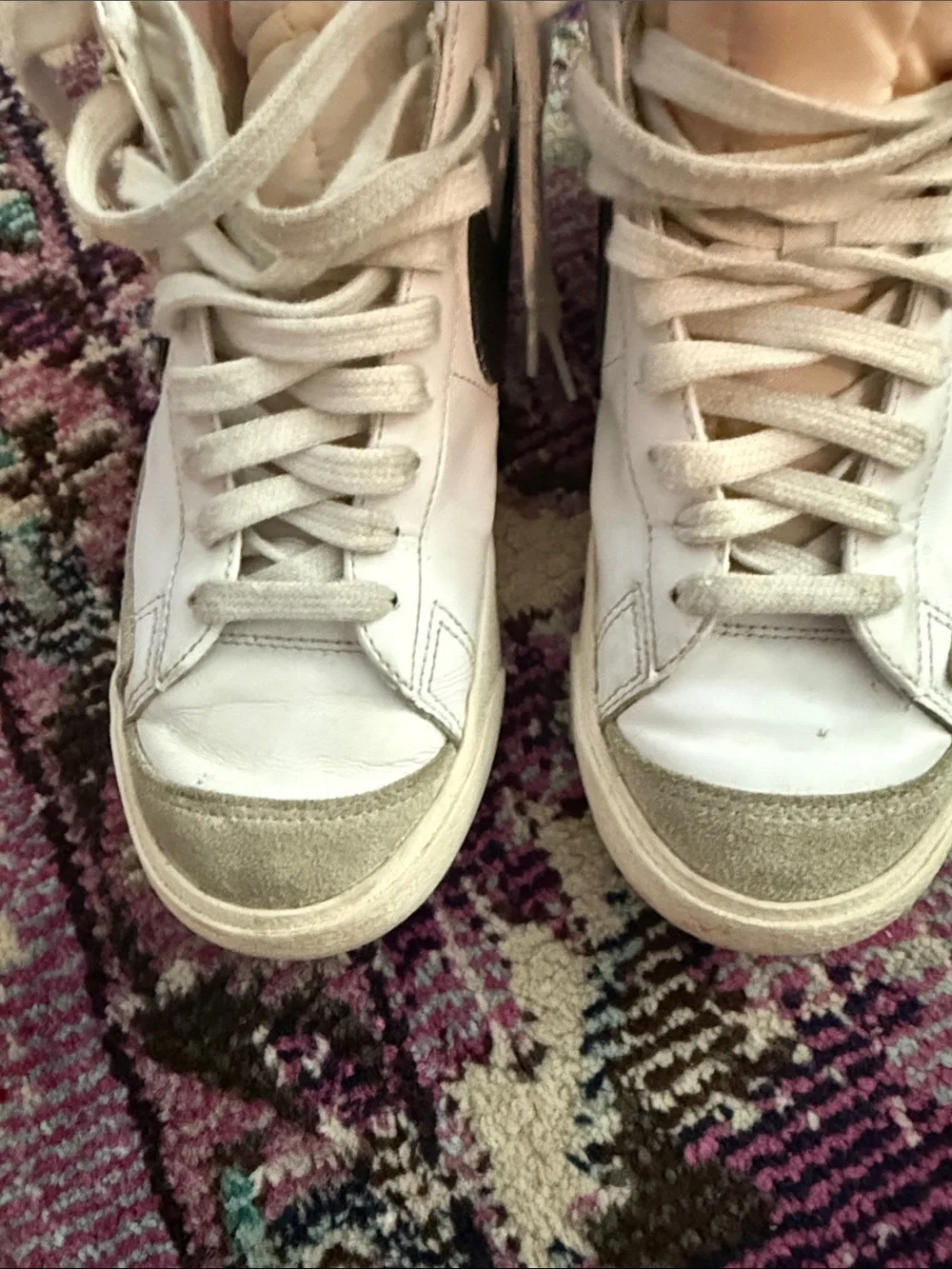 Nike White High-Top Sneakers with Black Swoosh